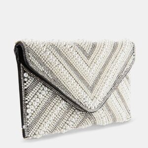 Steve Madden Bkoko pearl and rhinestone embellished clutch‎ bag.